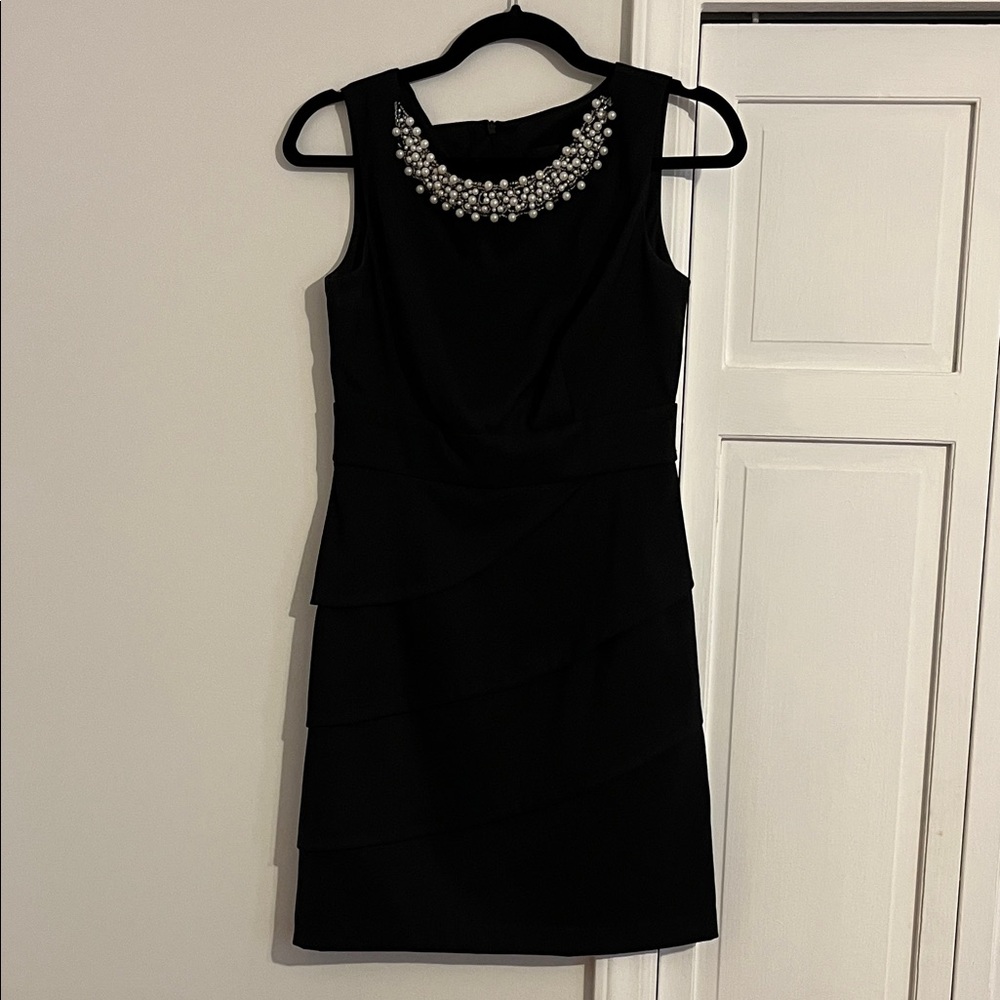 Elegant Black Sleeveless Dress with Pearl Detailing
